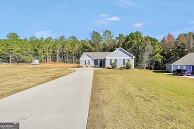 129 Magnolia Trail, Milner, GA 30257 - photo 2