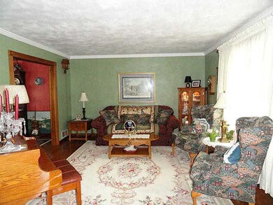 Living Room. Formal living room with crown mouldin