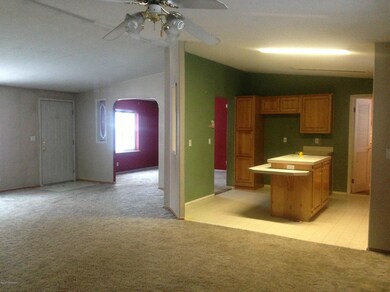 Looking toward kitchen and dining area