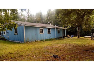 Exterior Front. Back of house