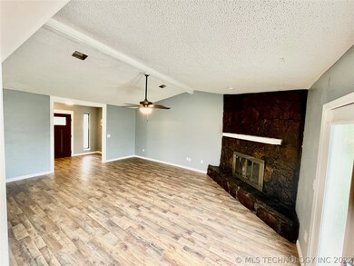 Large Inviting Living Space with Vaulted Ceiling