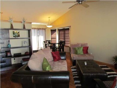 open living room looking into the dining area
