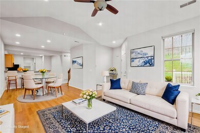LIVING ROOM/DINING AREA FLOWS SEEMLESSLY MAKING IT