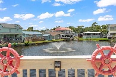 Water view with nearby suburban area