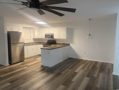 Kitchen featuring stainless steel appliances, a pe
