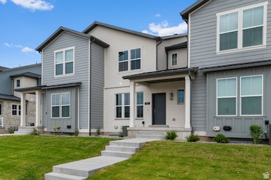 View of front of property featuring a front lawn