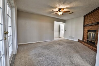 Unfurnished living room with a fireplace, ceiling 