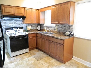 Beautiful Dine In Kitchen with Accent Backsplash, 