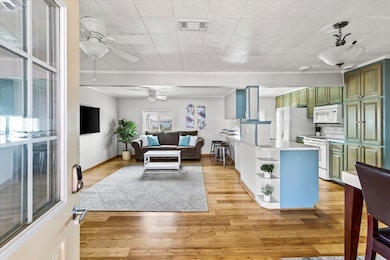 Entering into the home. Open Living, Dining and Ki