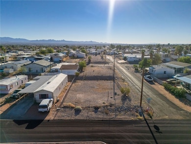 Aerial view of residential area with mountains