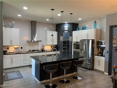 Kitchen with appliances with stainless steel finis