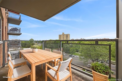 Balcony featuring outdoor dining area