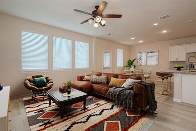 The kitchen, breakfast and family room areas flow
