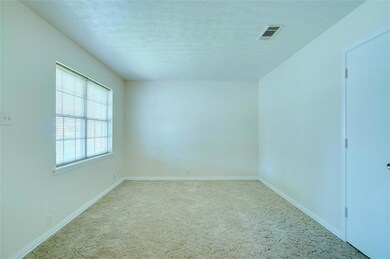 LIVING AREA WITH NATURAL LIGHTING & NEUTRAL COLORS...