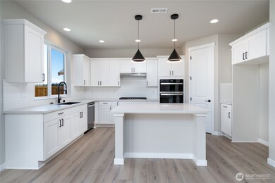 Photos are of another home in the community and are for illustration purposes only to reflect typical finishes.  May depict seller enhancements.  Colors and options may vary.