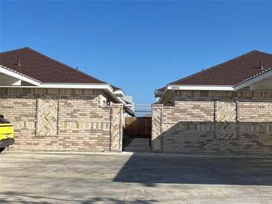 View of home's exterior with roof with shingles