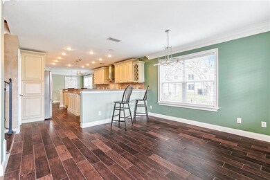 Dining/kitchen near the entry of the home is open
