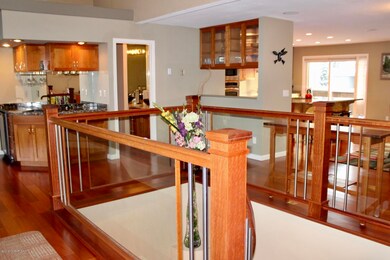 Custom Cherry and clear paneled railing