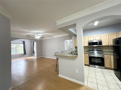 12843 Madison Pointe Cir unit 201, Orlando, FL 32821 - photo 2