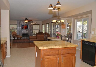 KITCHEN OPENS INTO FAMILY ROOM