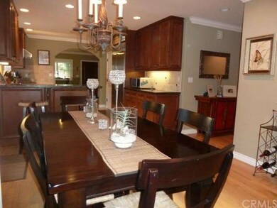 Dining area opens to the kitchen and living room a