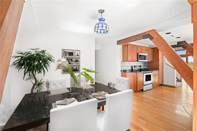 Dining Room with hardwoods and window seat