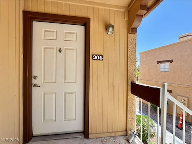 Entrance to property featuring a balcony