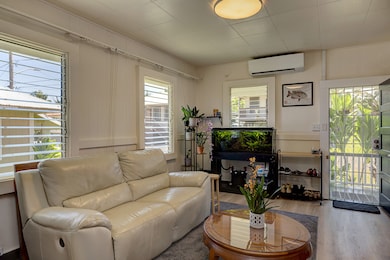 Living room is home to the split AC system.