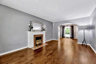 Granite and wood wrapped fireplace.