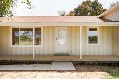 Large front porch with plenty of room for that swi