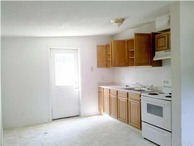Kitchen with door to the back yard