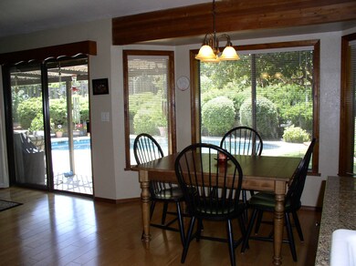Dining area overlooking pool!
