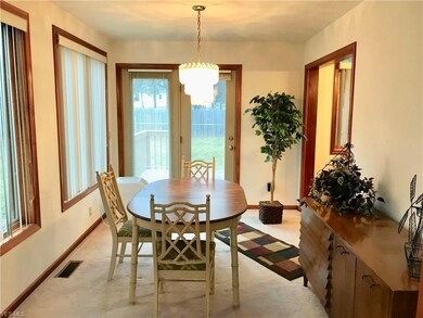 Dining Room with sliders to deck and private backy