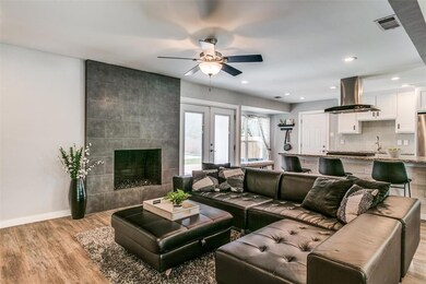 Clean lined living area is open to the kitchen