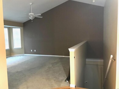 Living Room and Stairs to basement