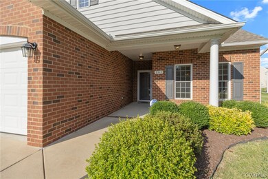 Entrance to property with a garage