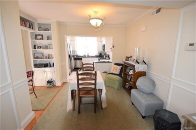 Formal Dining Room. Hardwood floors, chair rail, c