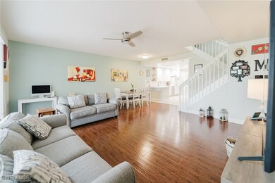 Living room with visible vents, baseboards, ceilin