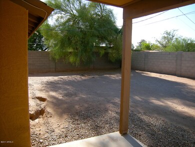 Backyard with covered patio