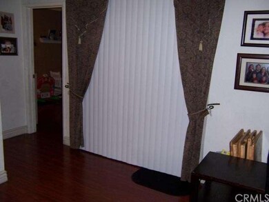 Slider Leads To Enclosed Patio & Garage