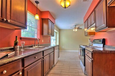 Kitchen with Dining Area in the background.