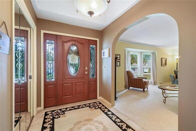 Enter into the tiled foyer.