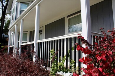 Enjoy the quiet neighborhood on the front porch.