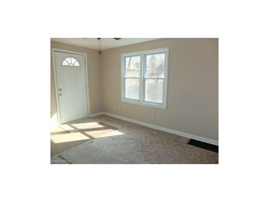 Living room with new carpet. Unit 718