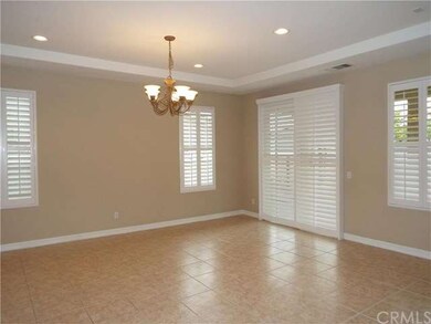 Dining room area with coffered ceiling.