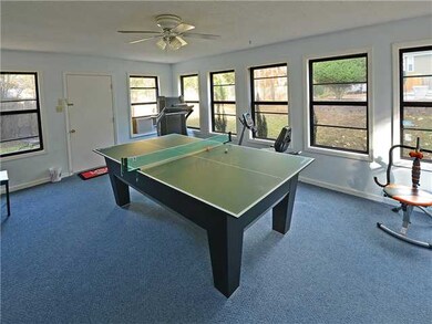 All season, heated and cooled sunroom has carpet, 