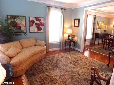 Living Room - hardwood floors, triple windows
