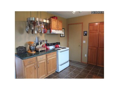 Kitchen is open to the dining area.