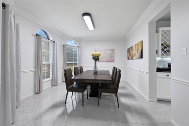Enter the formal Dining room, Where timeless elega