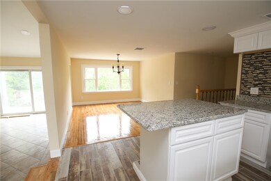 Open Concept EIK w/ View of Formal Dining Room & G
